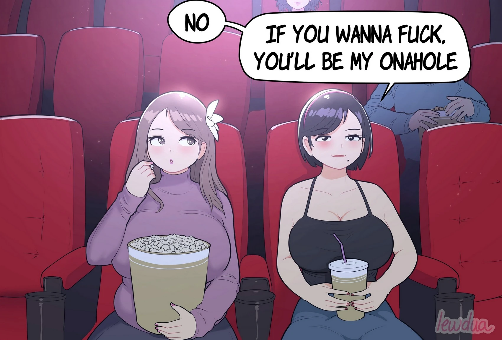 Couple in a movie theater in an intimate moment